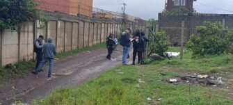 Hallan cuerpo sin vida con signos de violencia en terreno baldío de Villa Nueva